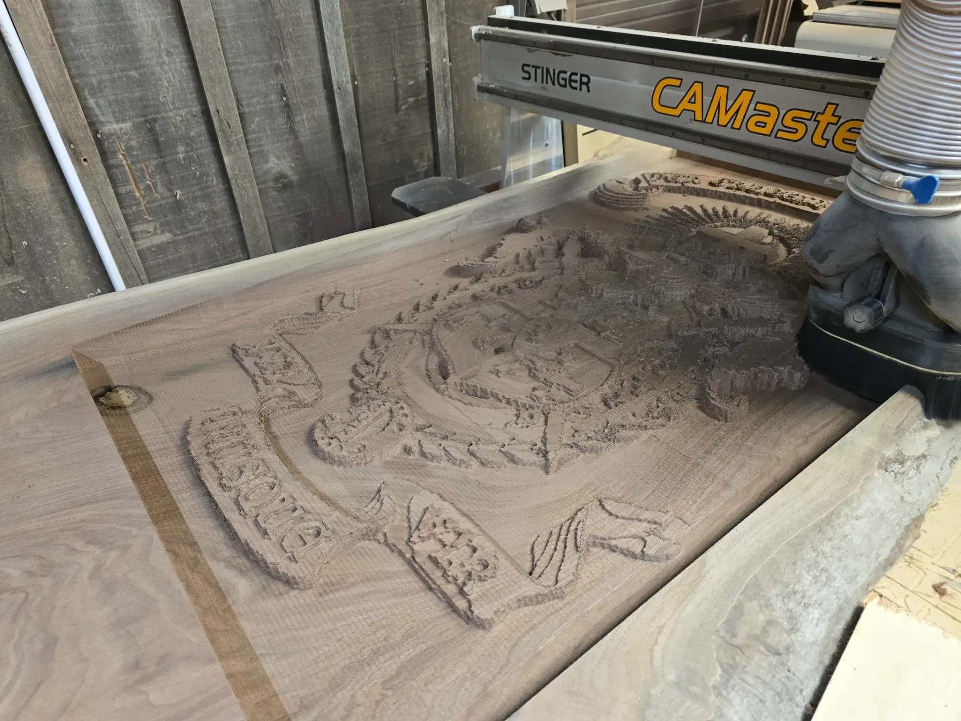 CNC carving in progress on hardwood